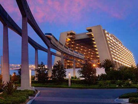 View of the monorail entering the Contemporary Resort at dusk.
