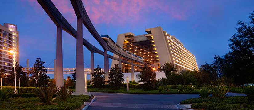 View of the monorail entering the Contemporary Resort at dusk.