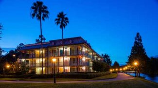 View of Port Orleans resort at night.