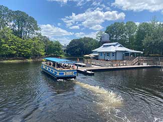 A Water Taxi docking at Port Orleans