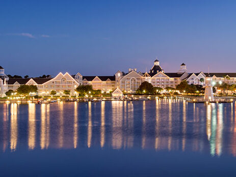 View of Disney's Yacht Club at night from the water