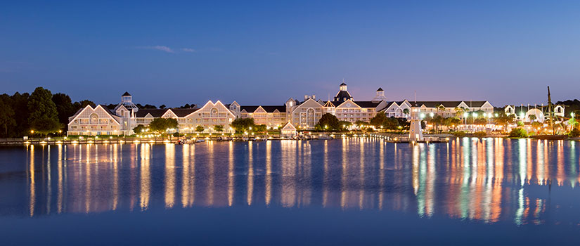 View of Disney's Yacht Club at night from the water