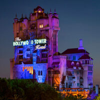 View of the Hollywood Hotel Tower of Terror at night in Disney's Hollywood Studios