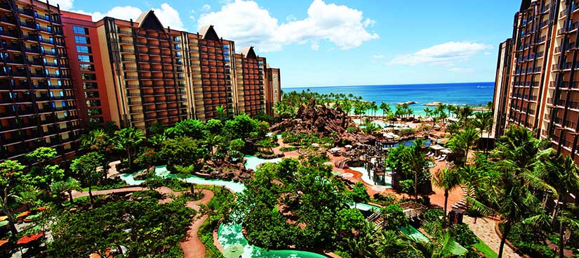 Exterior view of the Aulani resort looking down at the lazy river and pools