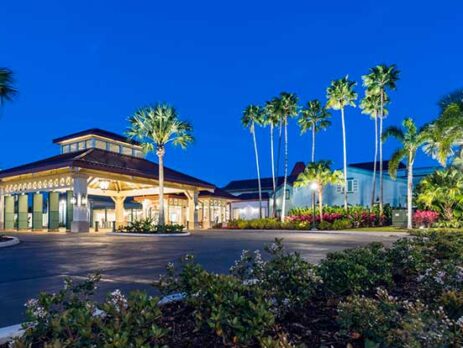 View of Disney's Caribbean Beach Resort's main entrance at night