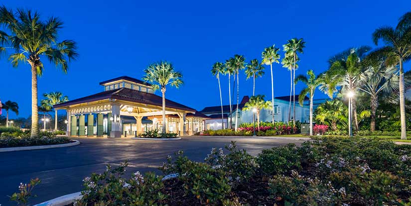 View of Disney's Caribbean Beach Resort's main entrance at night