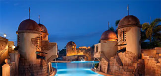 View of the Caribbean Beach Resort main pool at night