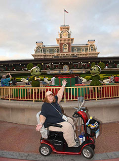 MVT Agent Carol in front of the Magic Kingdom Train Station