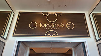 View of the sign above the entrance to Topolino's
