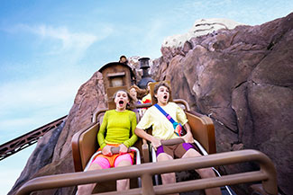 Teenagers screaming while riding Expedition Everest at Disney's Animal Kingdom